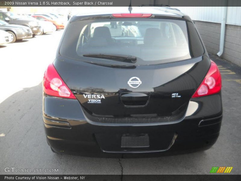 Super Black / Charcoal 2009 Nissan Versa 1.8 SL Hatchback