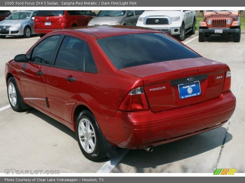 Sangria Red Metallic / Dark Flint/Light Flint 2005 Ford Focus ZX4 S Sedan