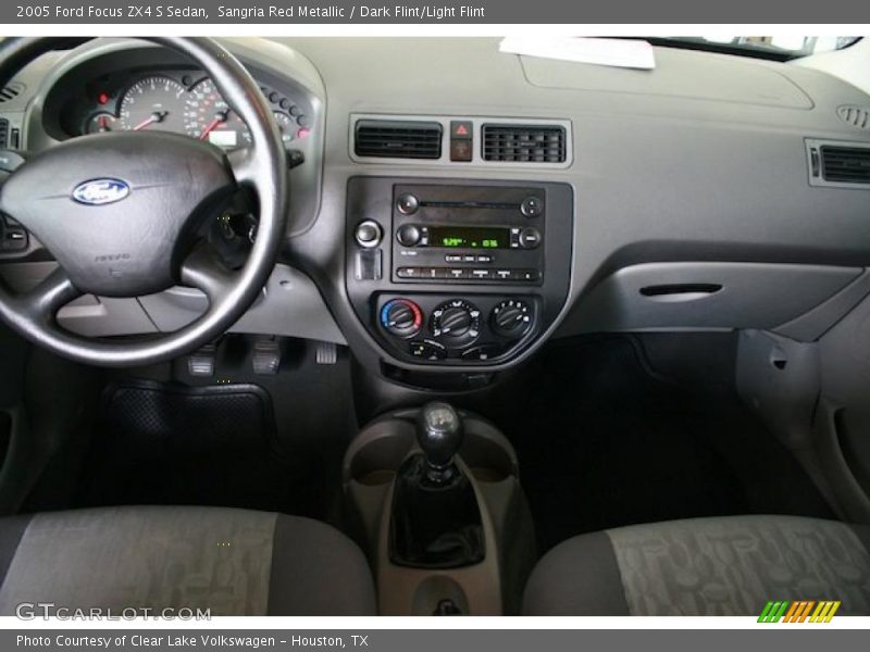 Sangria Red Metallic / Dark Flint/Light Flint 2005 Ford Focus ZX4 S Sedan