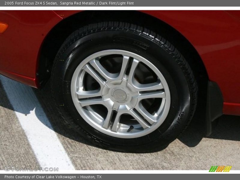 Sangria Red Metallic / Dark Flint/Light Flint 2005 Ford Focus ZX4 S Sedan