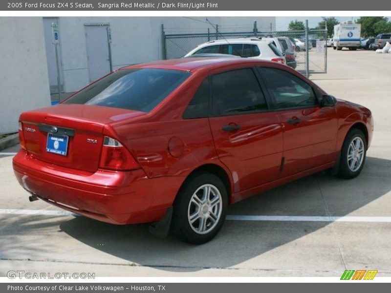 Sangria Red Metallic / Dark Flint/Light Flint 2005 Ford Focus ZX4 S Sedan