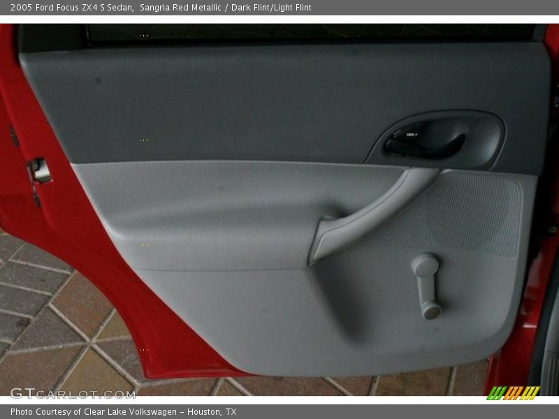Sangria Red Metallic / Dark Flint/Light Flint 2005 Ford Focus ZX4 S Sedan