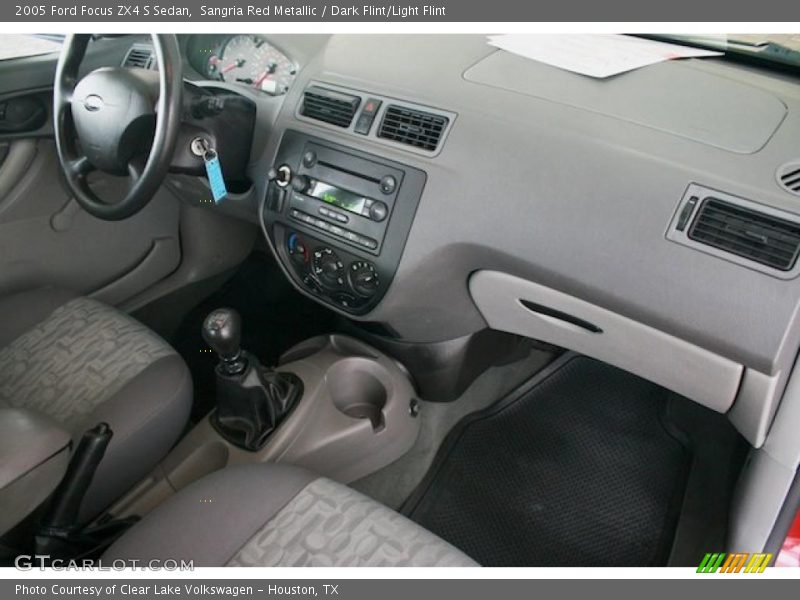 Sangria Red Metallic / Dark Flint/Light Flint 2005 Ford Focus ZX4 S Sedan