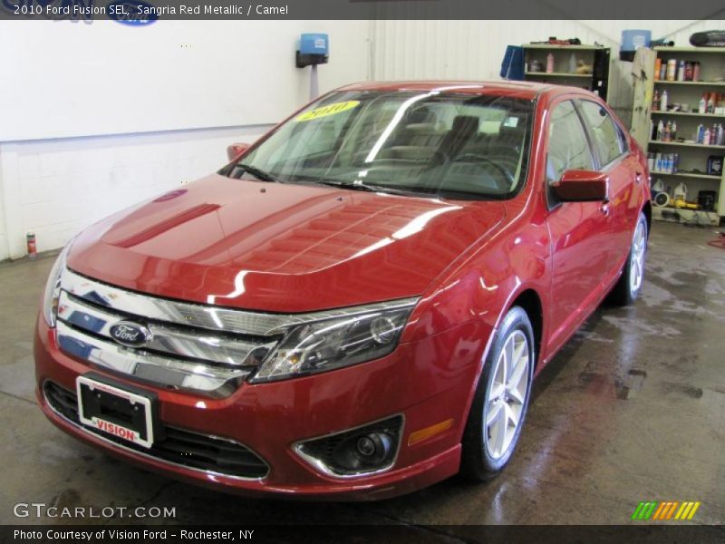 Sangria Red Metallic / Camel 2010 Ford Fusion SEL