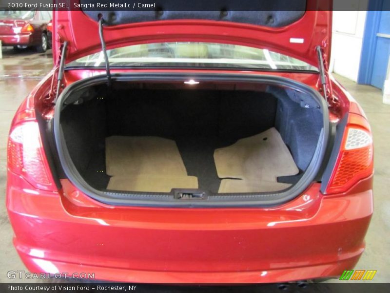 Sangria Red Metallic / Camel 2010 Ford Fusion SEL