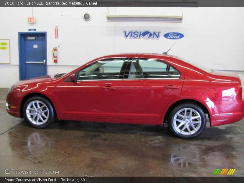 Sangria Red Metallic / Camel 2010 Ford Fusion SEL