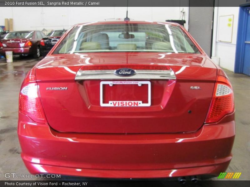 Sangria Red Metallic / Camel 2010 Ford Fusion SEL