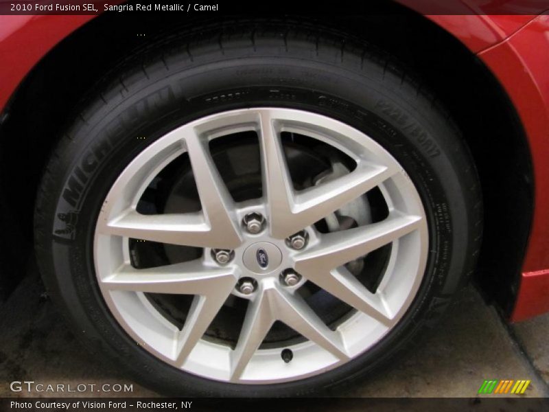 Sangria Red Metallic / Camel 2010 Ford Fusion SEL