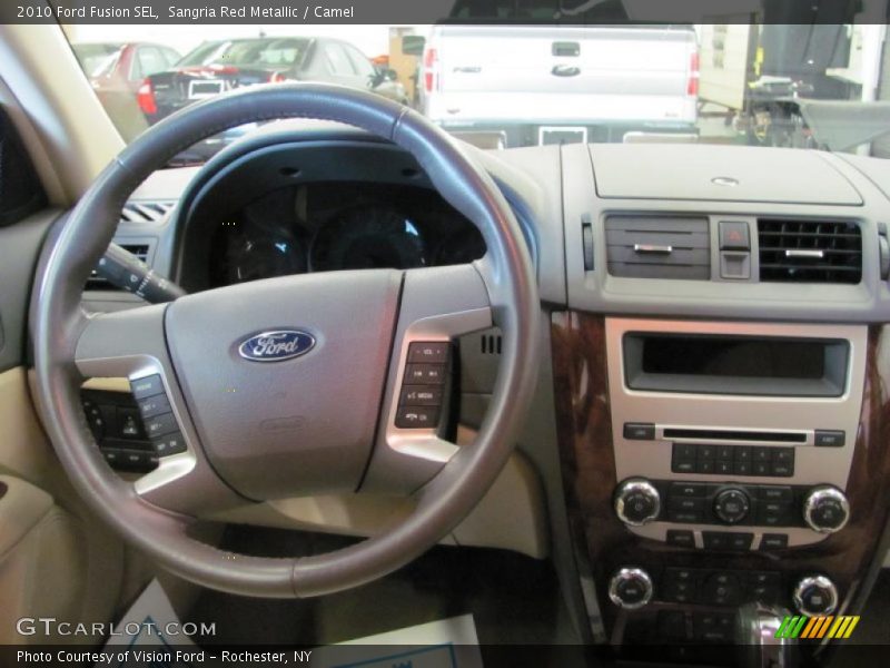 Sangria Red Metallic / Camel 2010 Ford Fusion SEL
