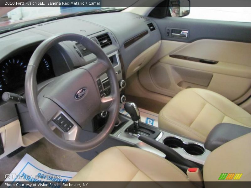 Sangria Red Metallic / Camel 2010 Ford Fusion SEL