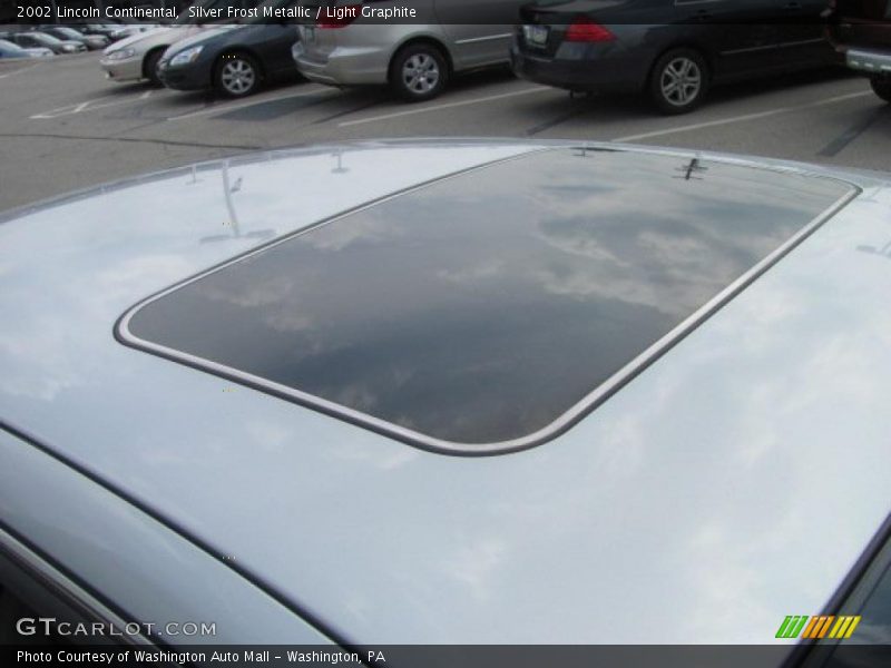 Silver Frost Metallic / Light Graphite 2002 Lincoln Continental