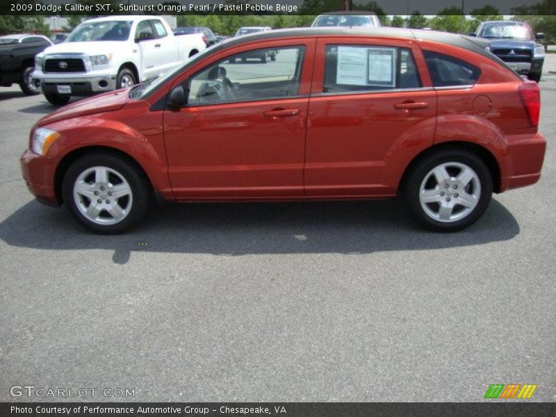 Sunburst Orange Pearl / Pastel Pebble Beige 2009 Dodge Caliber SXT