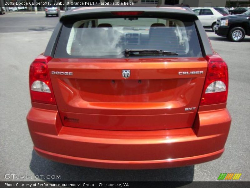 Sunburst Orange Pearl / Pastel Pebble Beige 2009 Dodge Caliber SXT