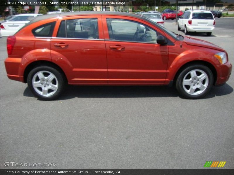 Sunburst Orange Pearl / Pastel Pebble Beige 2009 Dodge Caliber SXT