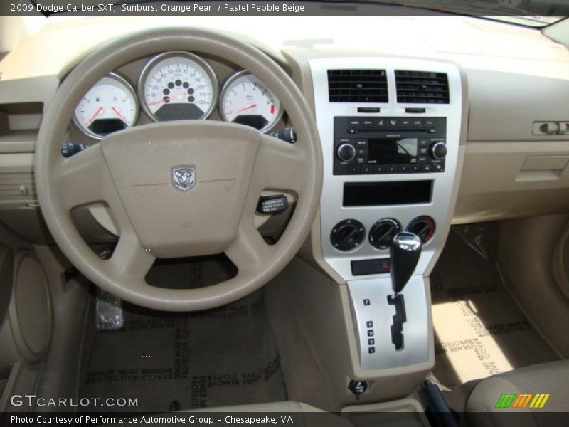 Sunburst Orange Pearl / Pastel Pebble Beige 2009 Dodge Caliber SXT