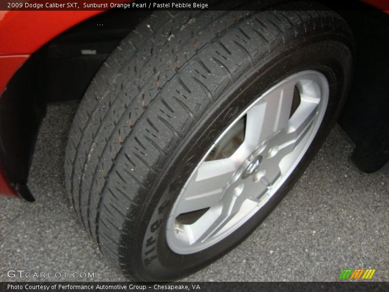 Sunburst Orange Pearl / Pastel Pebble Beige 2009 Dodge Caliber SXT