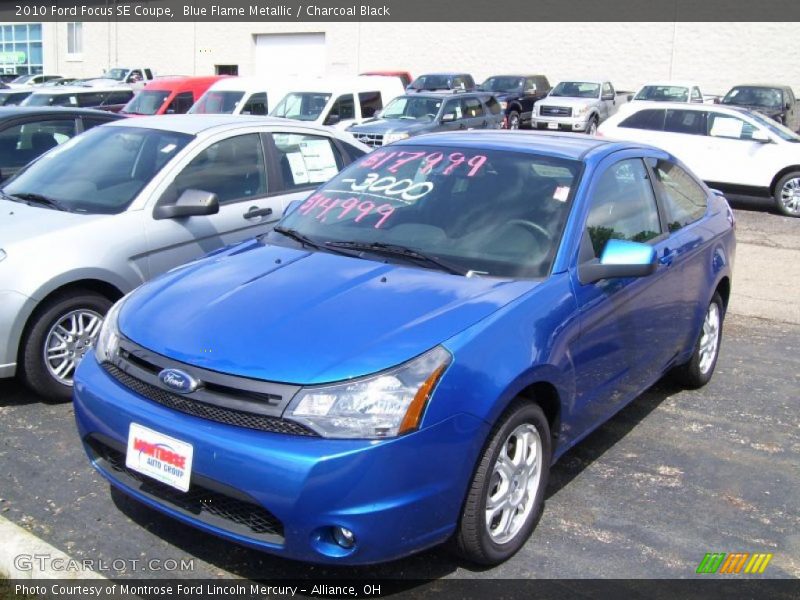 Blue Flame Metallic / Charcoal Black 2010 Ford Focus SE Coupe