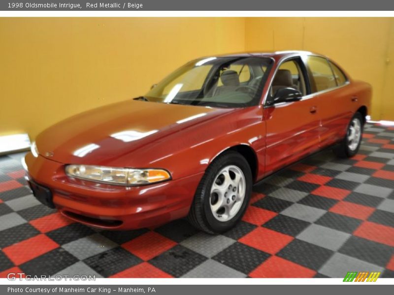 Red Metallic / Beige 1998 Oldsmobile Intrigue