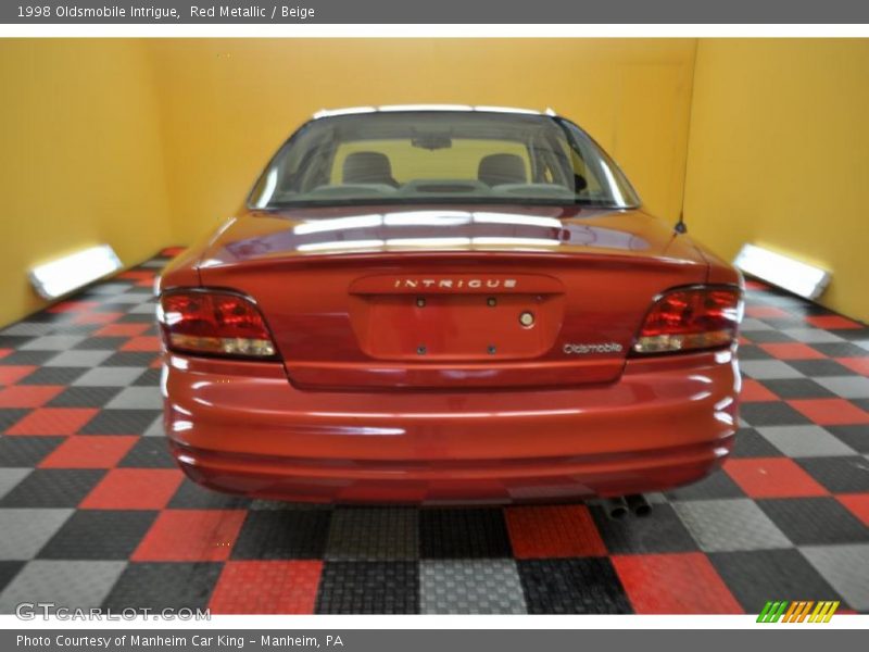 Red Metallic / Beige 1998 Oldsmobile Intrigue