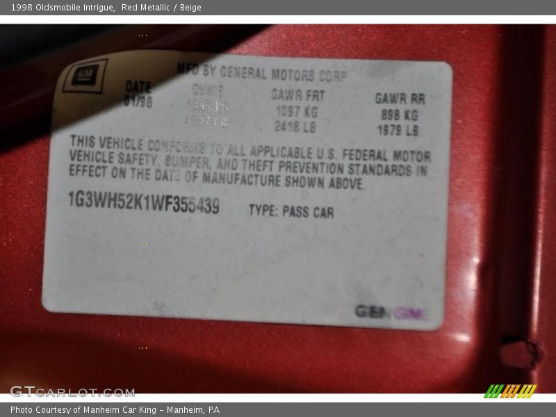 Red Metallic / Beige 1998 Oldsmobile Intrigue