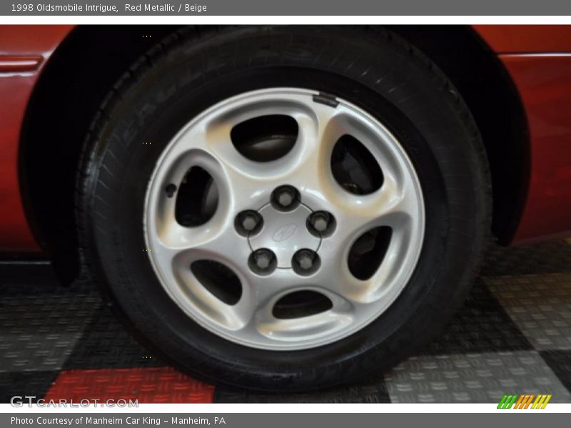 Red Metallic / Beige 1998 Oldsmobile Intrigue