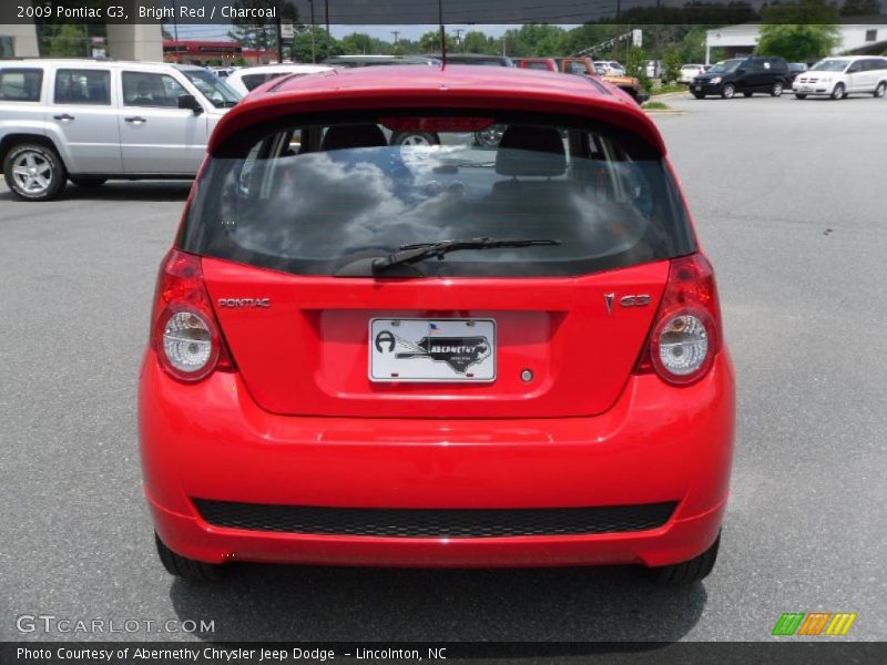 Bright Red / Charcoal 2009 Pontiac G3