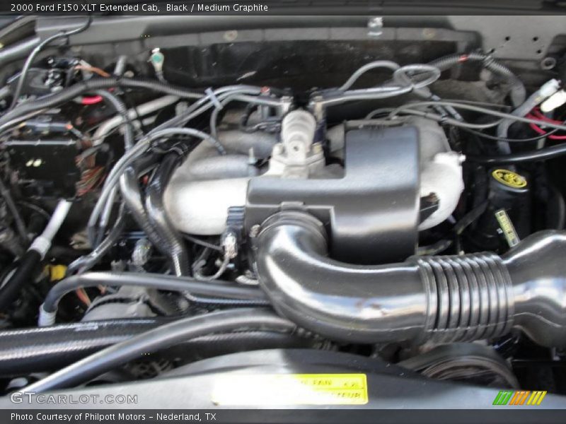 Black / Medium Graphite 2000 Ford F150 XLT Extended Cab