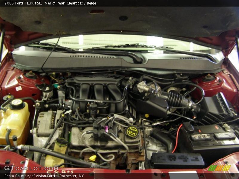 Merlot Pearl Clearcoat / Beige 2005 Ford Taurus SE