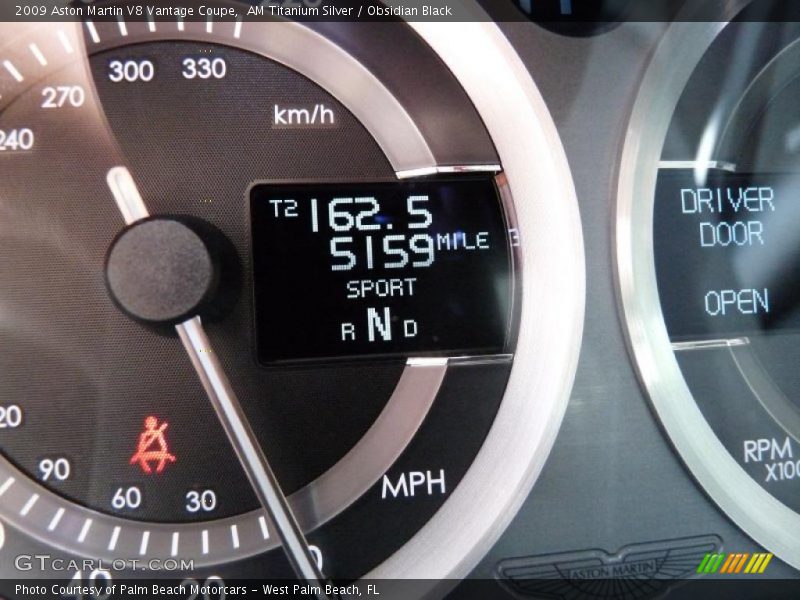 AM Titanium Silver / Obsidian Black 2009 Aston Martin V8 Vantage Coupe