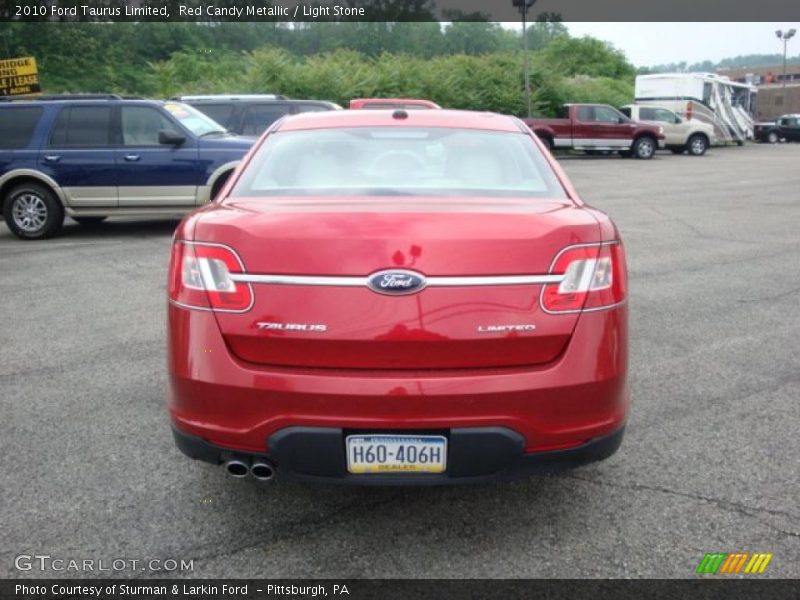 Red Candy Metallic / Light Stone 2010 Ford Taurus Limited
