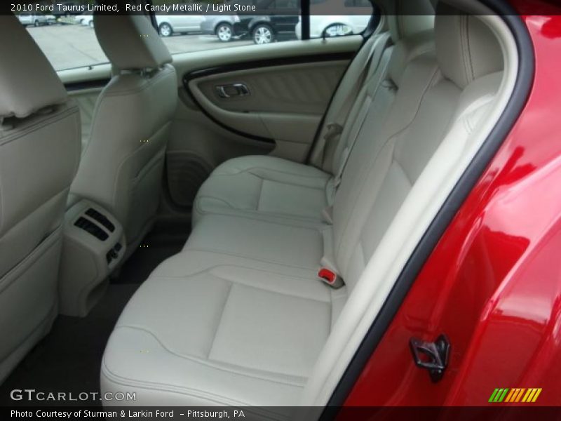 Red Candy Metallic / Light Stone 2010 Ford Taurus Limited