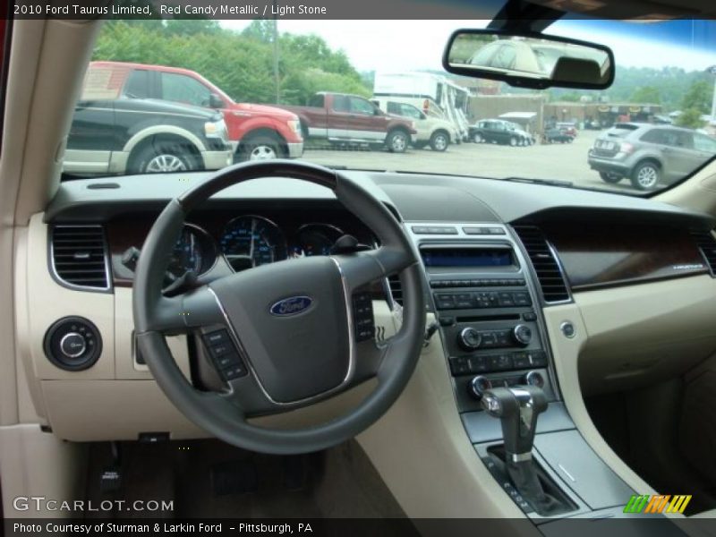 Red Candy Metallic / Light Stone 2010 Ford Taurus Limited