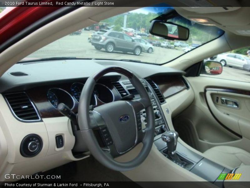 Red Candy Metallic / Light Stone 2010 Ford Taurus Limited