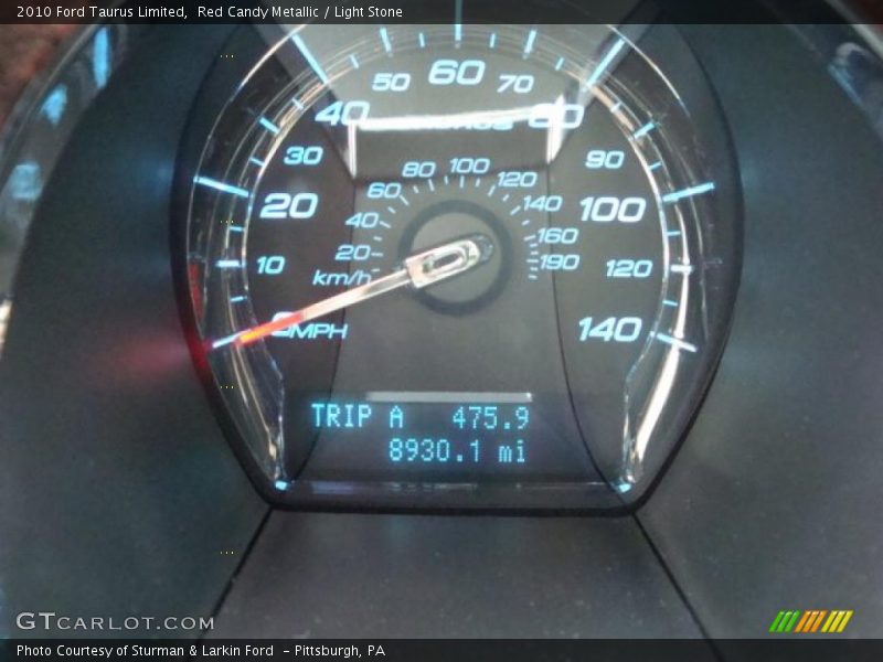 Red Candy Metallic / Light Stone 2010 Ford Taurus Limited