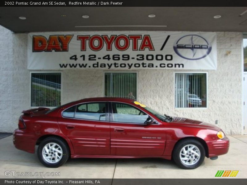 Redfire Metallic / Dark Pewter 2002 Pontiac Grand Am SE Sedan
