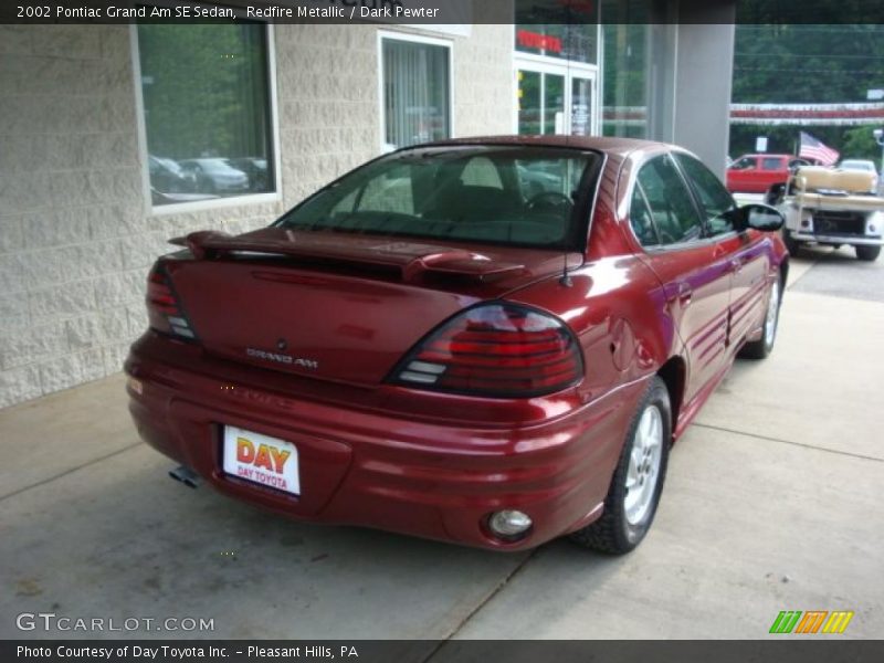 Redfire Metallic / Dark Pewter 2002 Pontiac Grand Am SE Sedan