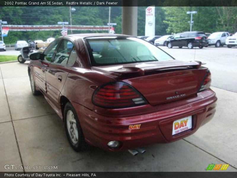 Redfire Metallic / Dark Pewter 2002 Pontiac Grand Am SE Sedan