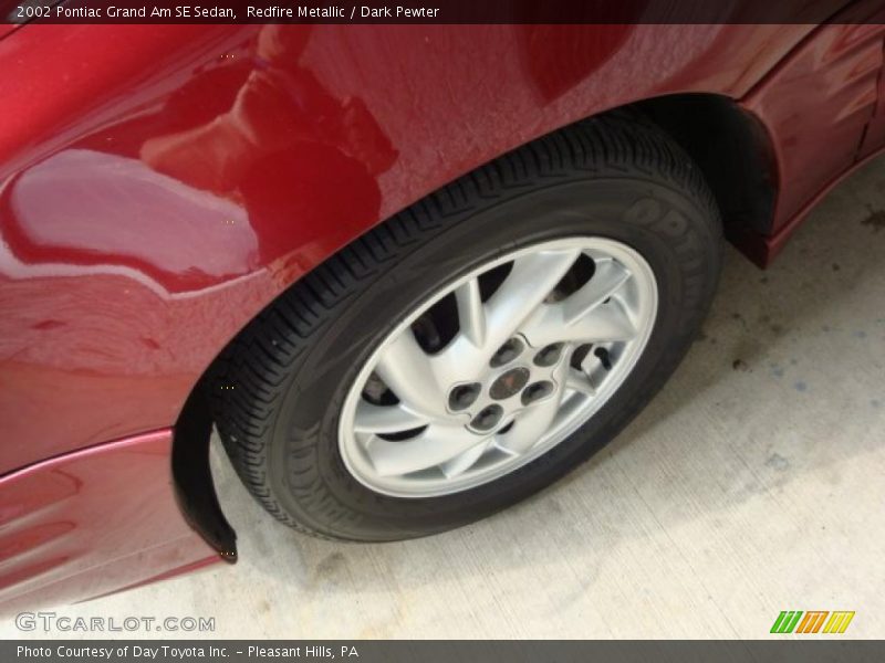 Redfire Metallic / Dark Pewter 2002 Pontiac Grand Am SE Sedan