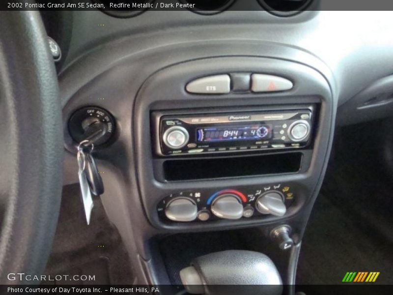Redfire Metallic / Dark Pewter 2002 Pontiac Grand Am SE Sedan