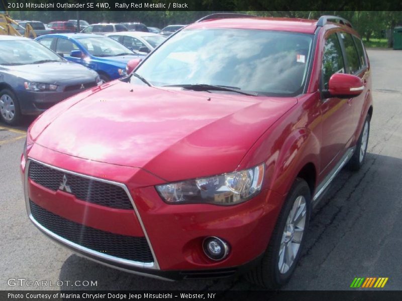 Rally Red Metallic / Black 2010 Mitsubishi Outlander SE 4WD