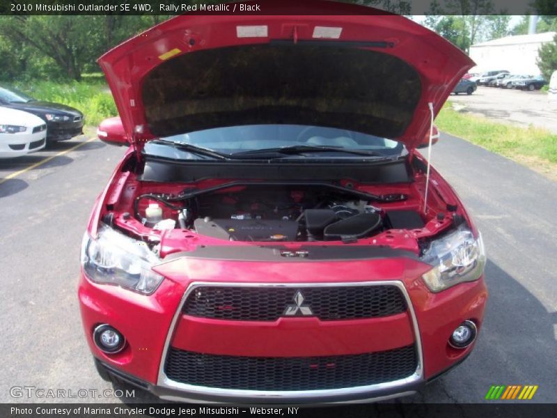 Rally Red Metallic / Black 2010 Mitsubishi Outlander SE 4WD