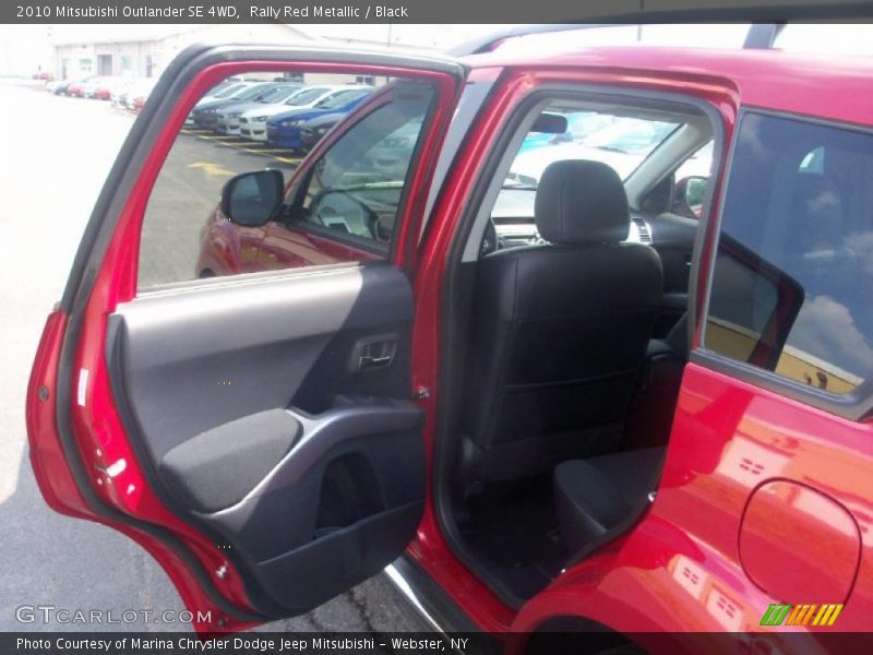 Rally Red Metallic / Black 2010 Mitsubishi Outlander SE 4WD