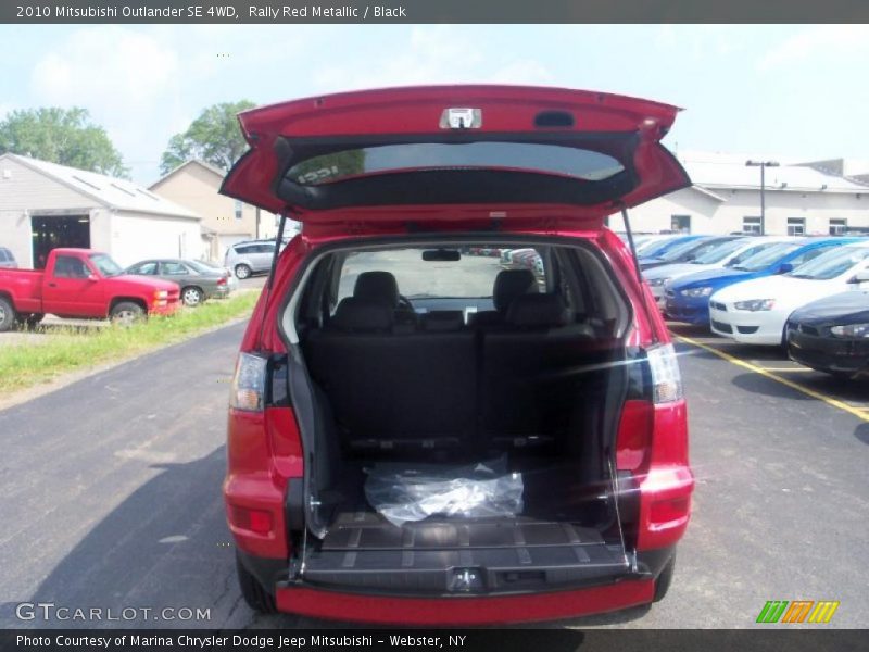 Rally Red Metallic / Black 2010 Mitsubishi Outlander SE 4WD
