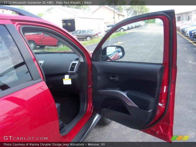 Rally Red Metallic / Black 2010 Mitsubishi Outlander SE 4WD