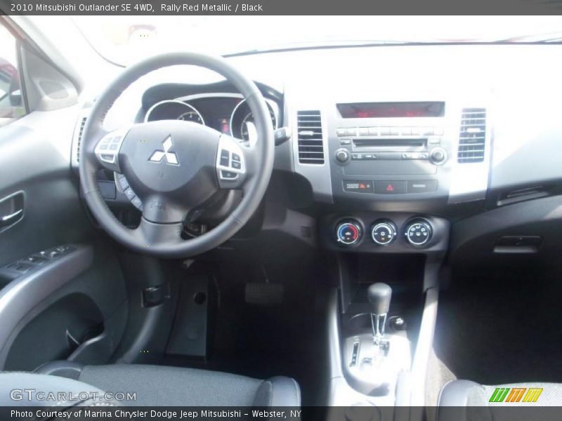 Rally Red Metallic / Black 2010 Mitsubishi Outlander SE 4WD