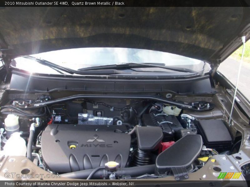Quartz Brown Metallic / Black 2010 Mitsubishi Outlander SE 4WD