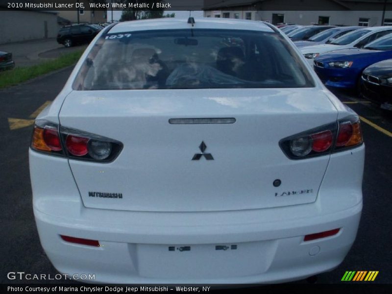 Wicked White Metallic / Black 2010 Mitsubishi Lancer DE