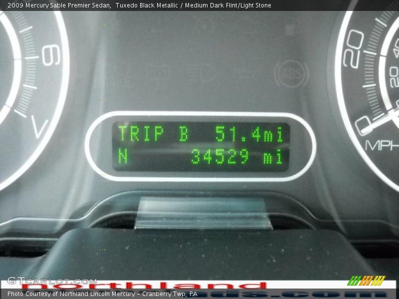Tuxedo Black Metallic / Medium Dark Flint/Light Stone 2009 Mercury Sable Premier Sedan
