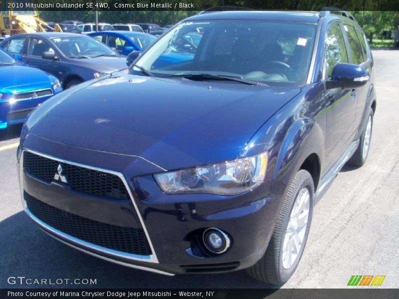 Cosmic Blue Metallic / Black 2010 Mitsubishi Outlander SE 4WD