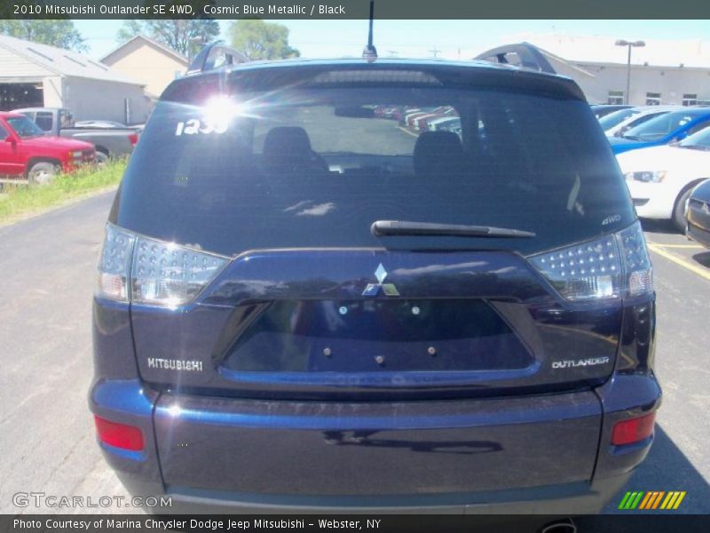 Cosmic Blue Metallic / Black 2010 Mitsubishi Outlander SE 4WD